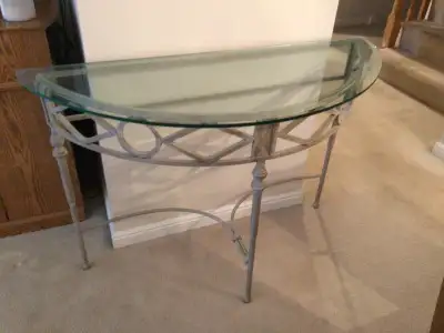Rod iron bottom thick tempered bevel glass top very heavy , no marks or chips in excellent condition...