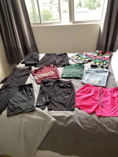 Selling a job lot of mostly brand named teenage boys summer clothes suitable for any tall slim perso...