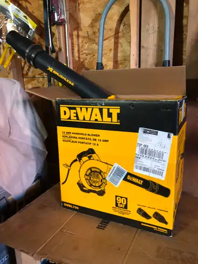 Dewalt (DWBL700) 12 amp corded electric handheld leaf/snow blower 189 MPH 409 CFM. Designed to withs...