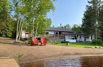 Get away from town and enjoy living in the country at this camp on the beautiful One Island Lake. Th...