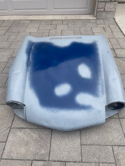 For sale - Late model Truimph Spitfire 1500 used hood/bonnet. Roughly primed with some rust and dent...