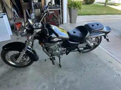 2002 Suzuki Marauder GZ 250 cc with only 24,855 kms. Runs like new. Bike doesn’t need anything to ru...