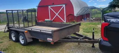 12 ft utility trailer, dual 3500lbs axles. Drop tailgate. New brakes, drums, bearings, jack. $3000 O...