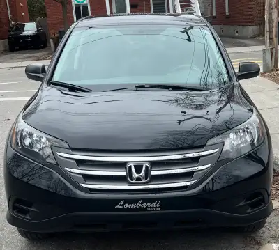 2013 Honda CRV AWD 94.000 km. Pneus été Pirelli avec mags Momo et pneus Hiver avec rims. 1 propriéta...