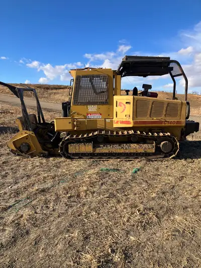 C140 Rayco Deere engine 1500 hours but in use Hydraulic winch Heat and AC 87500 Call or text 4037419...