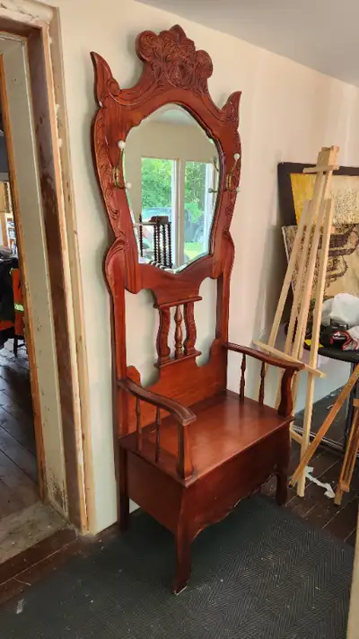 Mahogany hallstand It is 84 inches tall and 31 inches wide. Very nice condition.