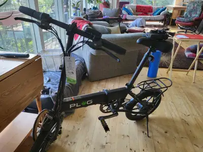Experience freedom on the go with the PLUG Foldable Electric eBike! This sleek, eco-friendly ride is...