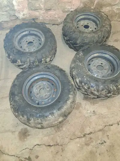 Kubota rtv tire and rims tires are worn hold air rims are in decent shape 200 or best offer may fit...