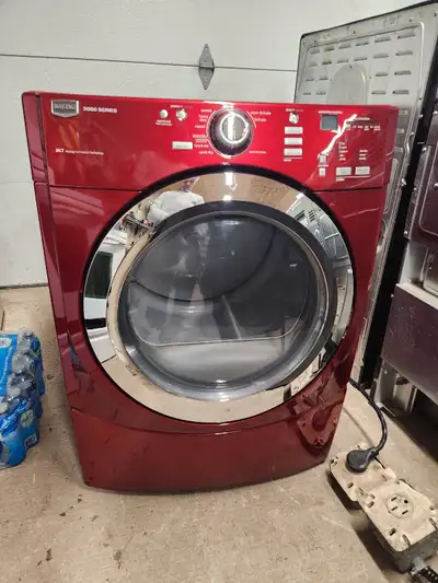 MAYTAG red front load type electric dryer for sale 250.00. Clean, works well. Tested and comes with...