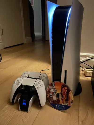 PS5 Disc Edition – 2 Controllers, Charging Dock + Free GTA, View more