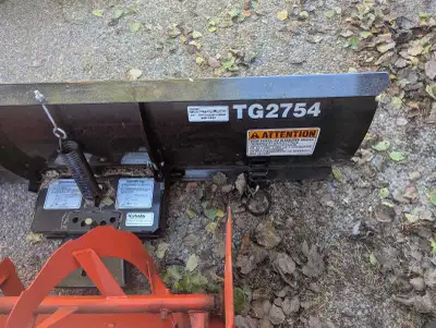 Like new, never used. Manual blade TG 2754. 54" wide. Can also include Quick hitch attachment for G6...