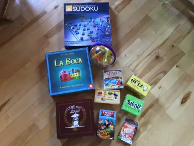 10 jeux de société: 45,00$ pour le tout. Dominos en bois, motifs animaux La boîte à quiz Trésors vol...