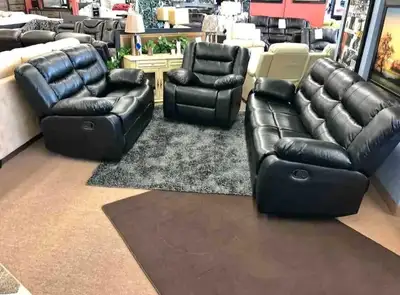 This brand new recliner sofa set features a reclining sofa, loveseat, and chair, perfect for adding...