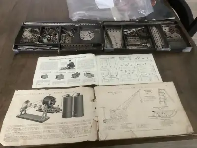 Very good condition vintage Meccano set,comes with catalog with costs . Great addition to any Meccan...