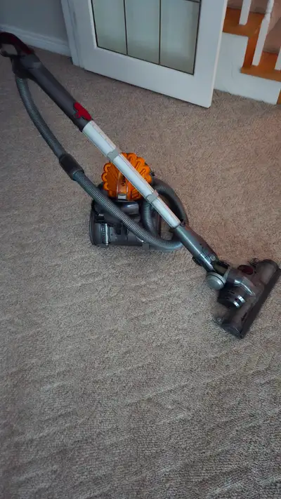 Dyson DC 23 model with several attachments. Pick up in Grand Bend.