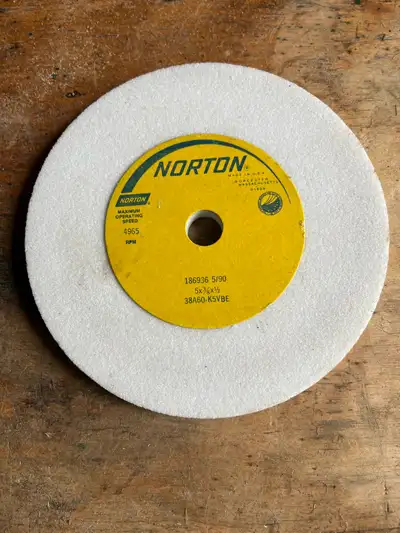 New 5” Norton beach grinding wheels: 1. 5” x 3/8” x 1/2” arbor white grinding wheel (2 available) 2....
