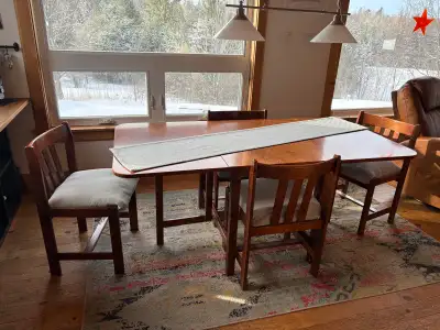Beautiful dining room set with 6 chairs. Solid wood. Started to reupholster chairs and will provide...