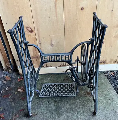 Antique Singer Cast Iron Treadle Sewing Machine Base. Measures 23.5” H x 24” W x 28” D ( bottom) or...