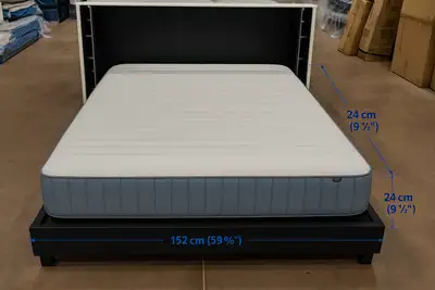 This is a new queen-size mattress complete with a bed frame, box spring, and mattress. It's all read...