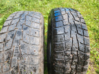 Two 275 65 r18 studded winter tires