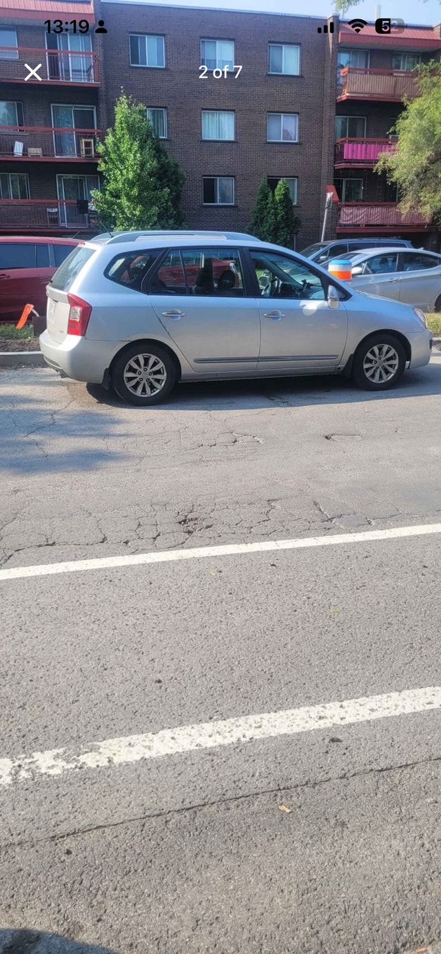 Kia Rondo 2011 — photo 2