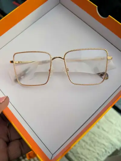 Gold colored eyeglasses frames, View more
