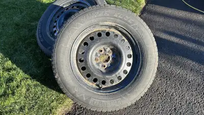4 Winter tire on rins, two matching pairs of 235/65R17, 2 of them are Good Year (couple of seasons l...