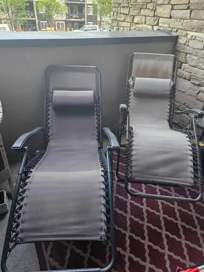 2 gravity chairs. A bit sun faded, and have been sitting in the shed for a while. No rips/tears $40...