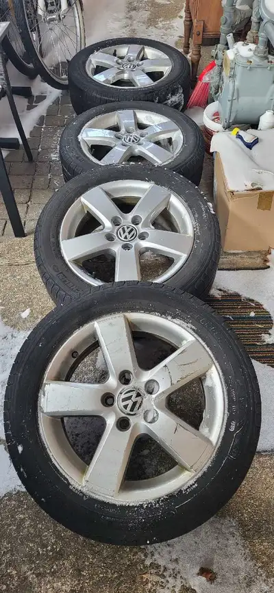 4 Used aluminum rims with all season tire 205/55R16 bolt pattern 5x112mm ,tire not very well , price...