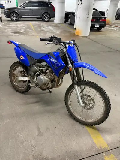 Under 40 hours, in great shape, kick and electric start. Tires in good shape - 4 stroke dirt bike th...