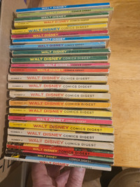 24 Walt Disney Digest books. Late 60s to 70s in years