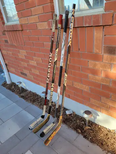 Four hockey sticks for one price mostly reebok, one is only good for ball hockey it's chipped on tip...