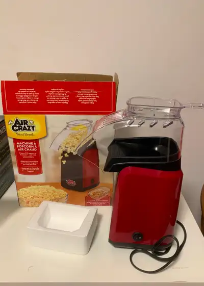 An Air-Crazy popcorn machine for only $8, sell as is. Pick up by yourself at Warden and Lawrence, Sc...