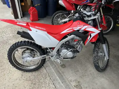 Like new Honda crf125f. Less than 10 hrs on bike from new. Son out grew bike. Electric start and fue...