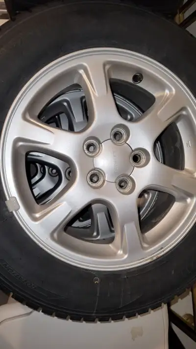 15 inch aluminum rims in excellent condition. Originally from a Subaru Legacy. Full set of Lug nuts...
