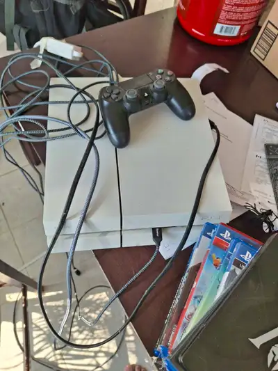 Special edition white PS4, controller, and games, View more