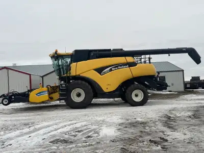 2005 New Holland CR970 with 2009 76C 14ft pick up header. Combine has been recently inspected and go...