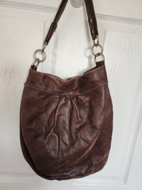 Roots leather bag