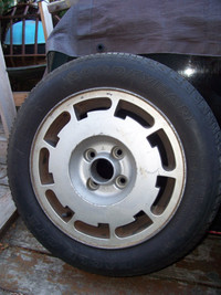 14"  VW Alloy wheel and tires for 85-95 JETTA  $60