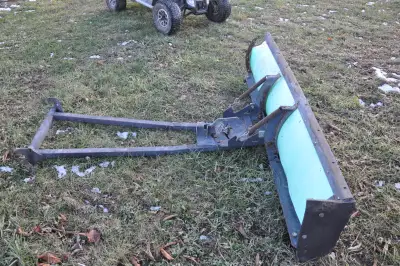 Snow plow/blade used with a winch lift. $100. Blade is 5 feet long and 15 inches high.