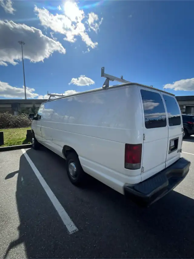 2004 FORD E250566535420957184002