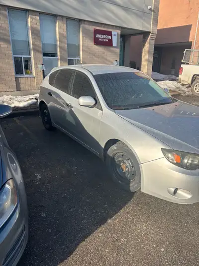 2008 Subaru Impreza automatic Comes with snow tires and summer tires on aluminum rims, Runs excellen...