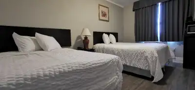Hotel rooms are available for $70 per night. Free parking. The room comes with two queen-size beds,...