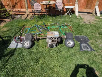 I am selling a used go-kart project, which includes the frame, engine, and wheels. The go-kart is in...
