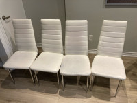 Four White Cushioned Kitchen Chairs 