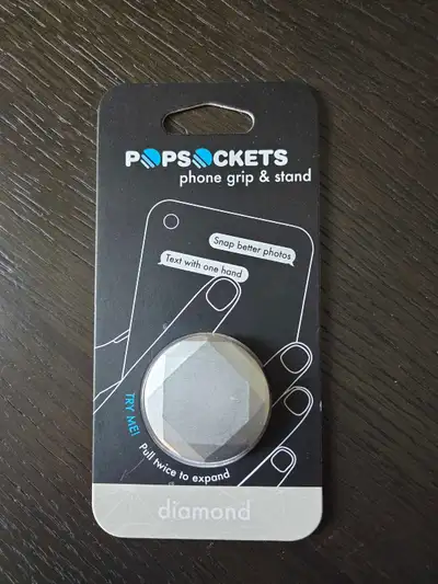 This is a new Popsockets Diamond phone grip and stand, perfect for texting with one hand and snappin...