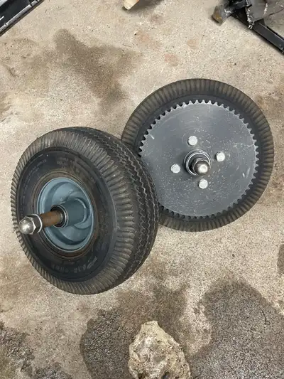 Front and Rear minibike wheels. New sprocket on rear. Both have new sealed bearings. 3/4” shaft. $40...