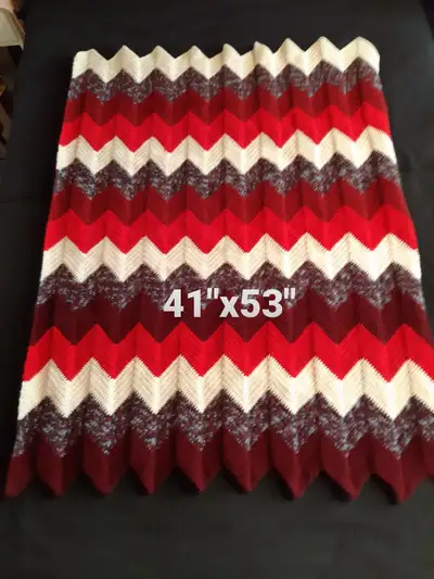 Handmade crocheted zig zag lap blanket. Made with chunky acrylic yarn. Must be picked up in Cranbroo...