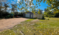 1500 sq ft Shop on 4 residential lots in Streamstown, AB