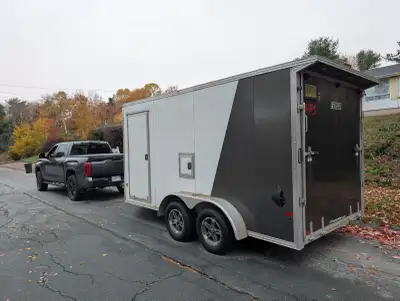 2022 EZ Hauler 2 place Aluminum snowmobile trailer drive in/drive out....2 door galvanized axles 9 i...